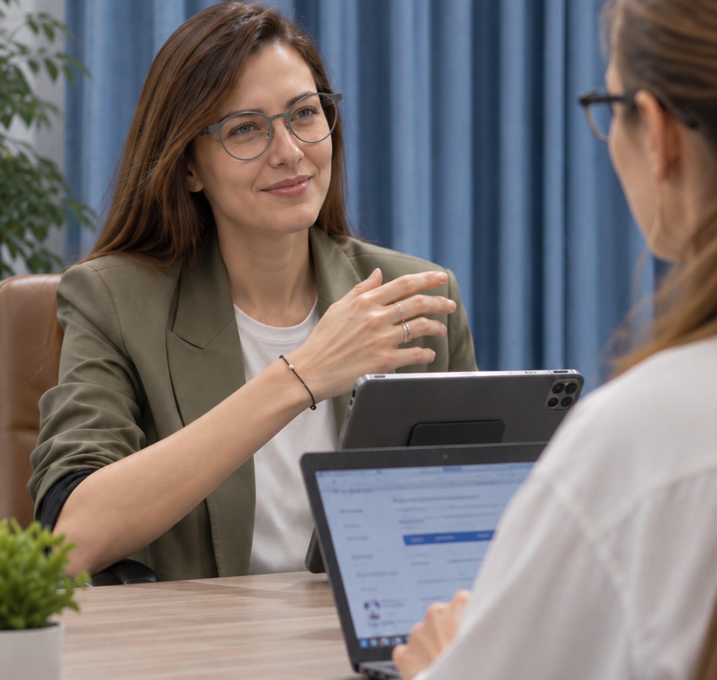 Professional wearing Dymesty Jobs Circle AI glasses during an office conversation