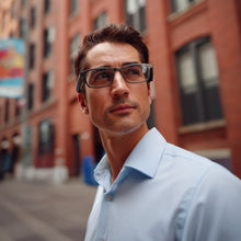 Professional man wearing Dymesty AI Glasses Cook Edge for business. Execute with Precision.