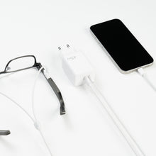 Dymesty Power Adapter charging a smartphone and AI glasses simultaneously. The essential tool for multi-device efficiency.