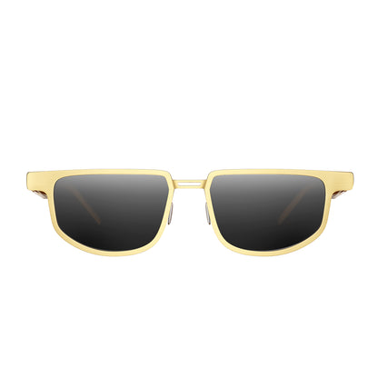 Dymesty Moore Vision AI smart sunglasses in gold frame with adaptive lenses