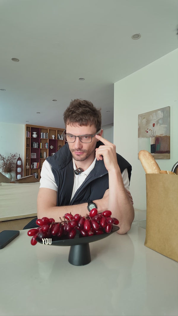 Customer using Dymesty AI glasses at home in a video review