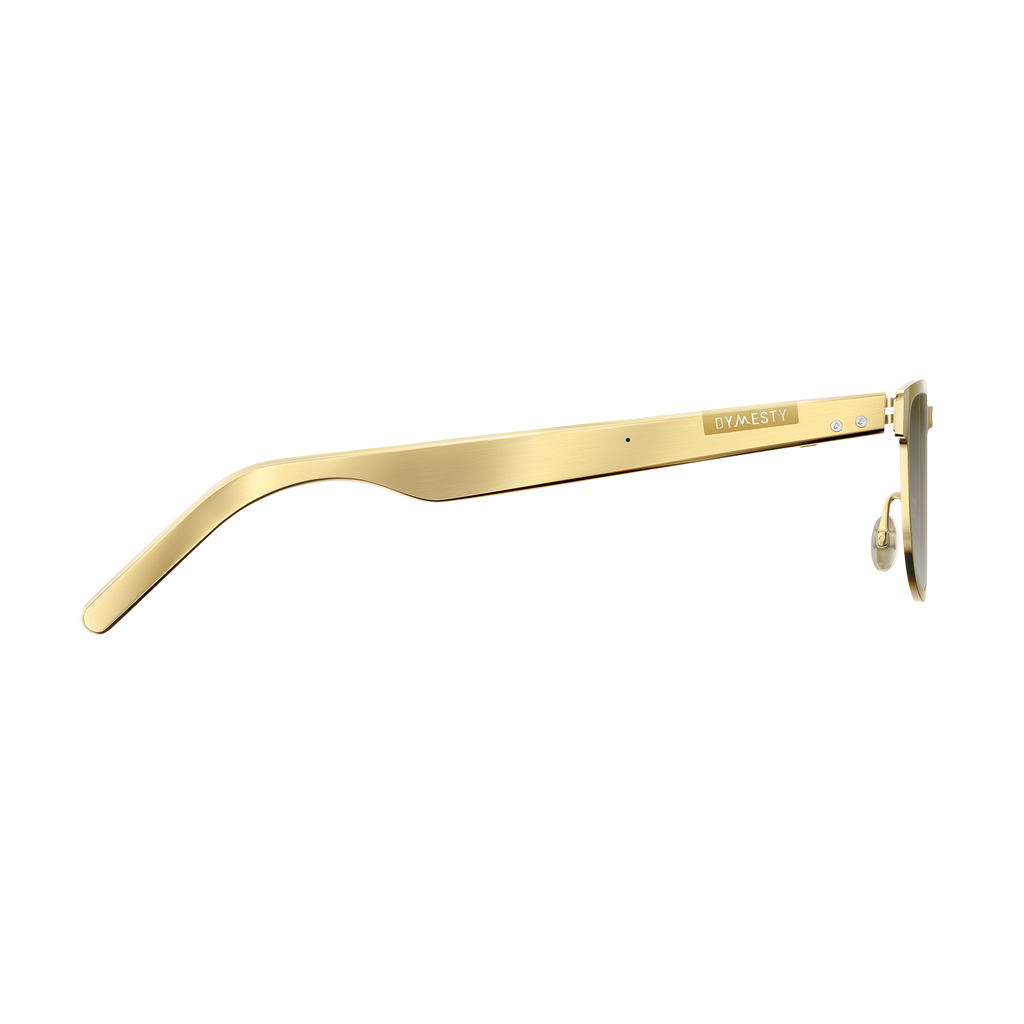 Dymesty Moore Vision AI Smart Sunglasses in champagne gold titanium frame with dark gray lenses, front view on transparent background — 35g lightweight, 48-hour battery, real-time translation in 100 languages, camera-free design